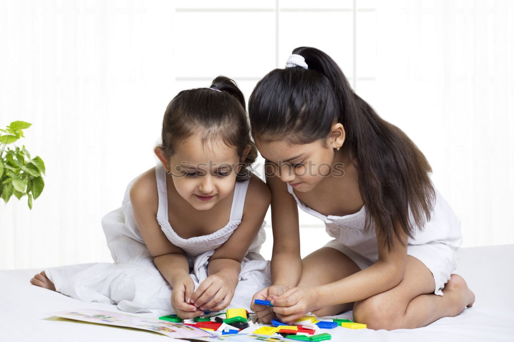 Similar – two beautiful sisters playing at home