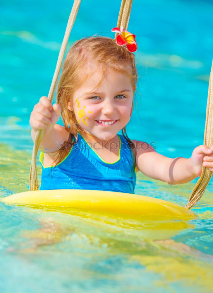 Similar – Kid in snorkel mask posing on poolside