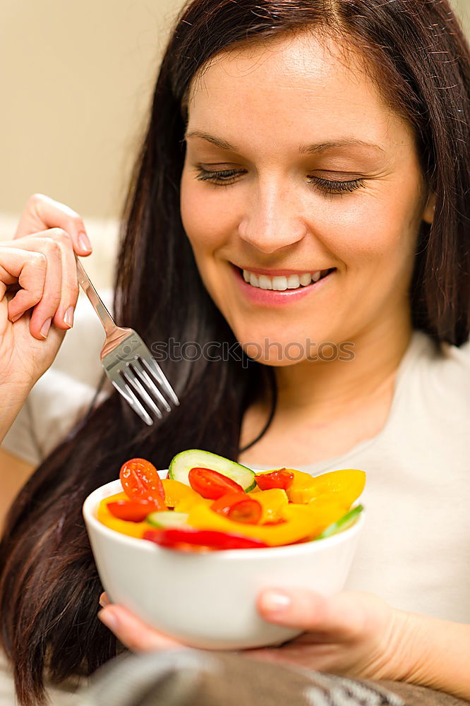 Similar – Content woman having meal