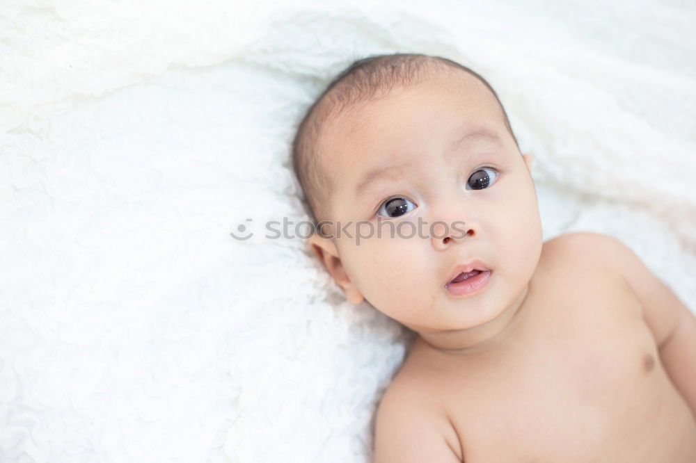 Similar – Image, Stock Photo newborn baby experiencing the world