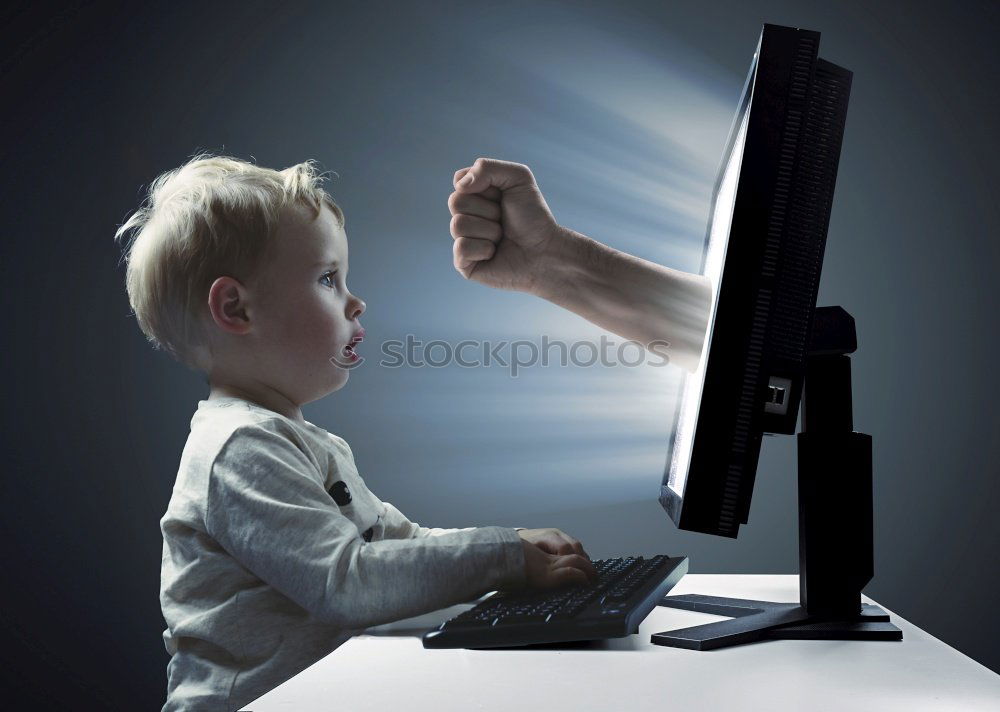 Similar – Image, Stock Photo Little boy sitting in his seat during a flight playing contentedly with a tablet computer in an airplane watched by his mother