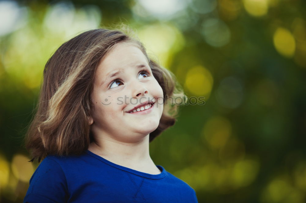 Similar – Image, Stock Photo Smiling girl between meadow with dry leaves