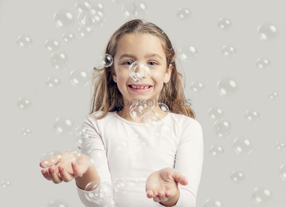 Similar – Image, Stock Photo Girl blowing balloon outside