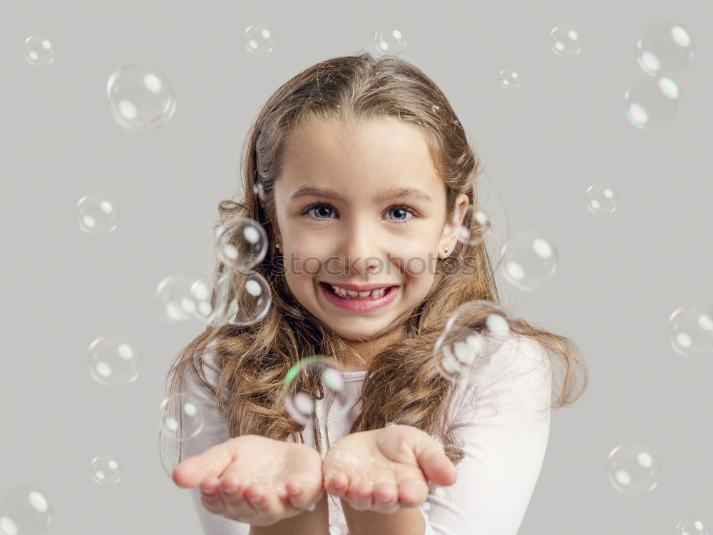 Similar – Image, Stock Photo Girl blowing balloon outside