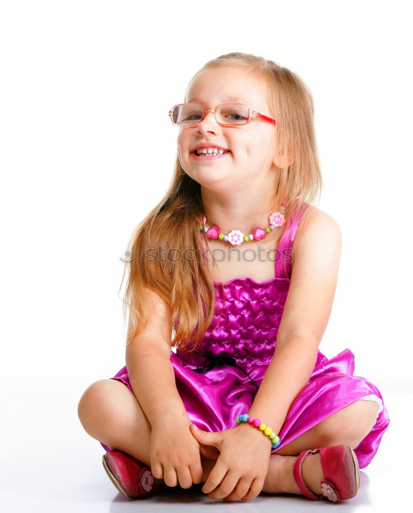 Similar – Little girl enjoying her role of princess. Adorable cute 5-6 years old girl wearing pink princess dress and tiara