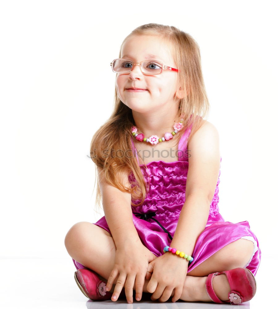 Similar – Little girl enjoying her role of princess. Adorable cute 5-6 years old girl wearing pink princess dress and tiara