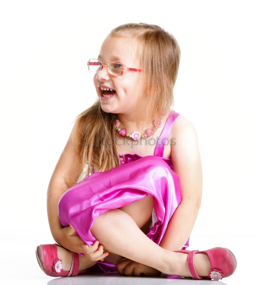 Similar – Little girl enjoying her role of princess. Adorable cute 5-6 years old girl wearing pink princess dress and tiara