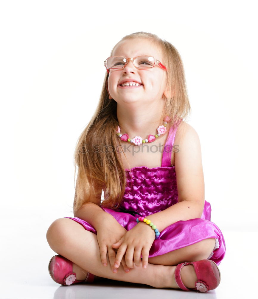 Similar – Little girl enjoying her role of princess. Adorable cute 5-6 years old girl wearing pink princess dress and tiara