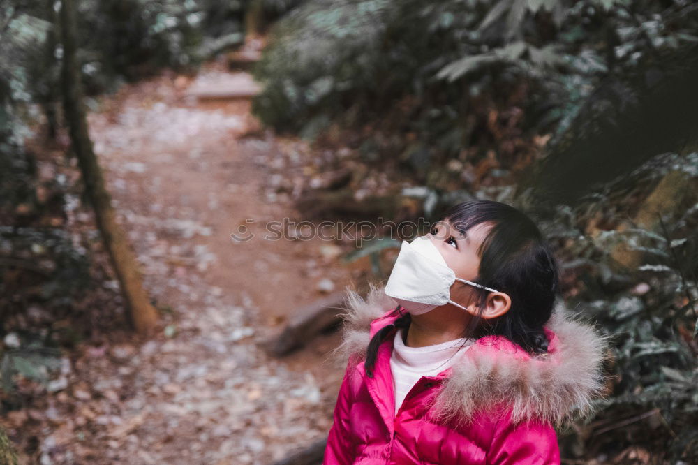 Similar – Image, Stock Photo Cheerful kid in costume posing on tree