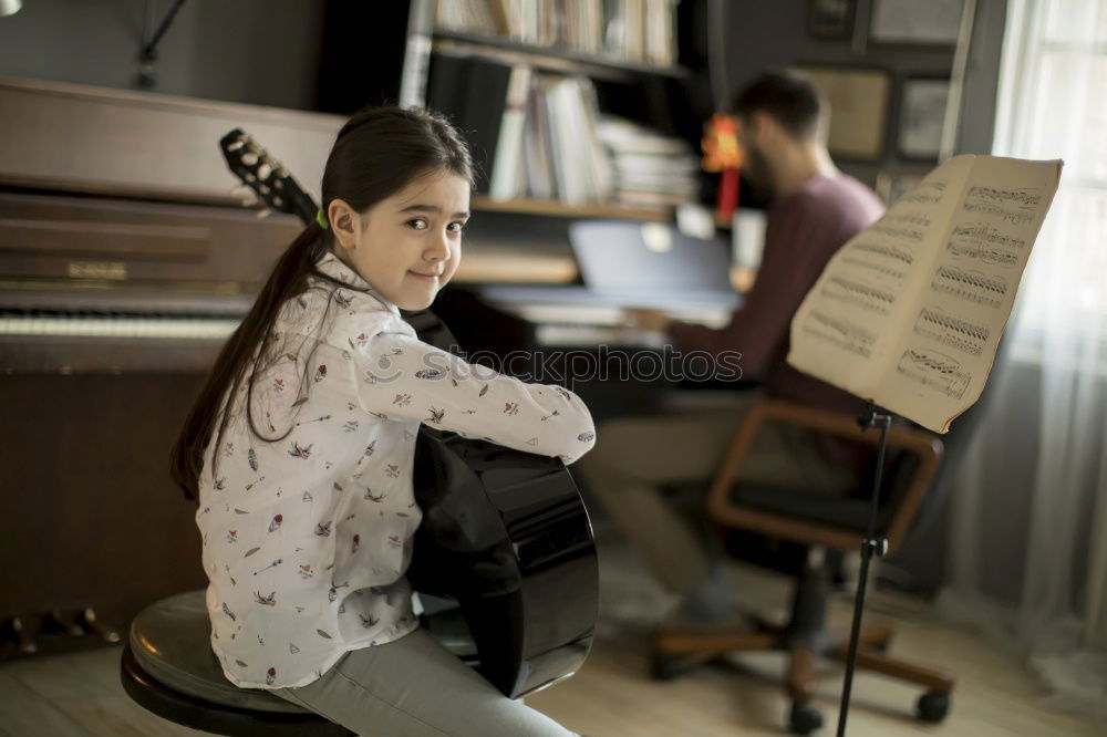 Similar – Image, Stock Photo young woman holding playing piano at home