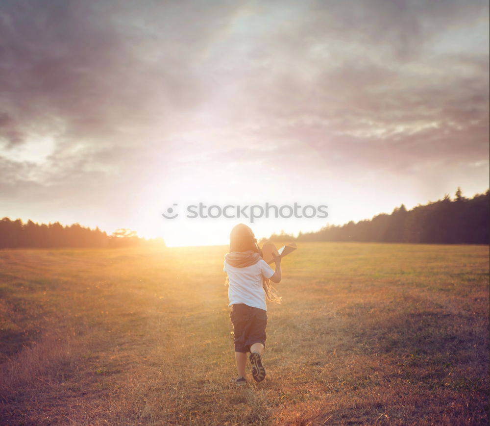 Similar – Image, Stock Photo Woman in green cold fields