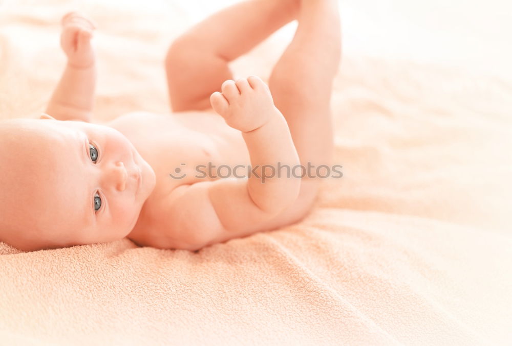 Similar – Portrait of a crawling baby on the bed in his room