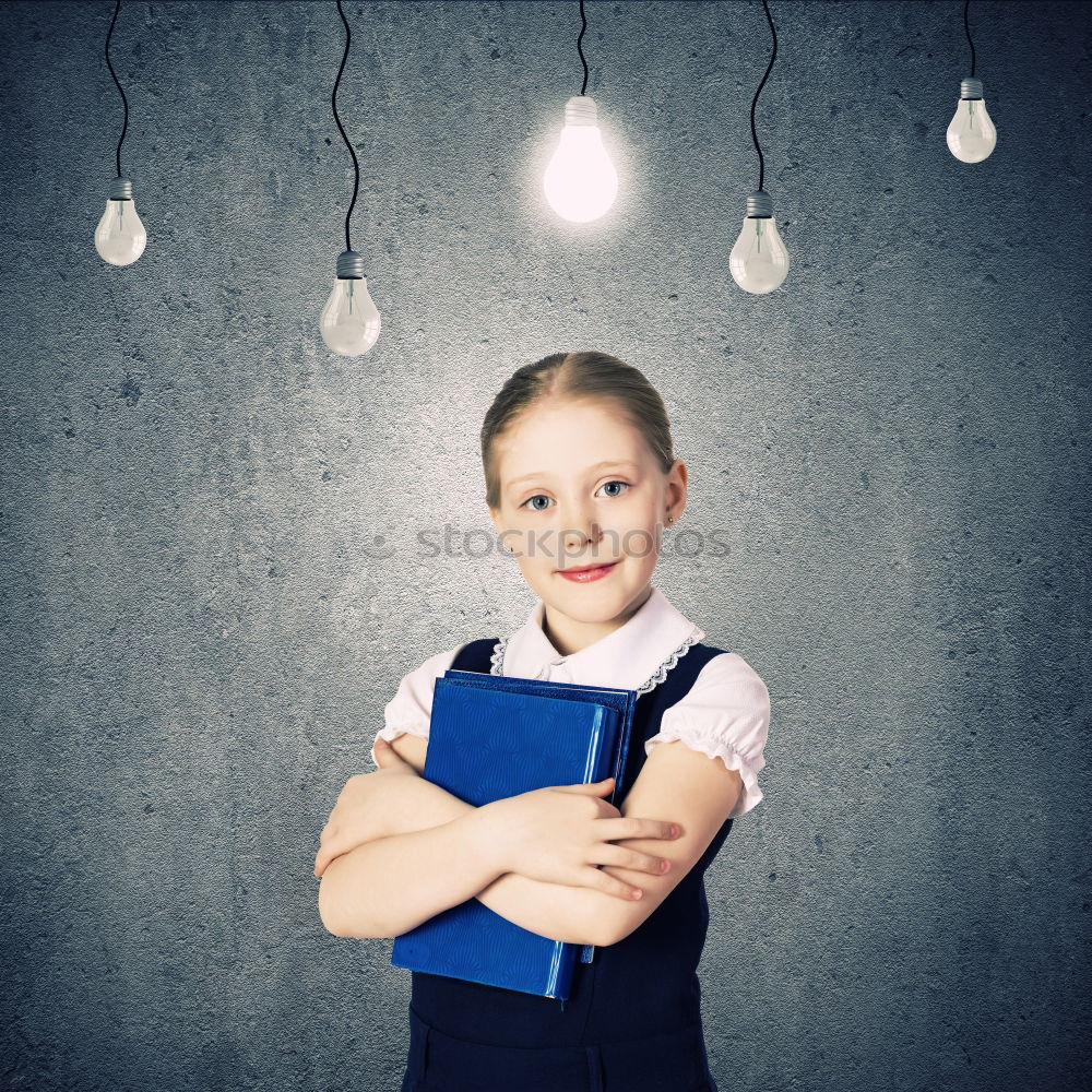 Similar – Image, Stock Photo Cute schoolgirl posing in a classroom