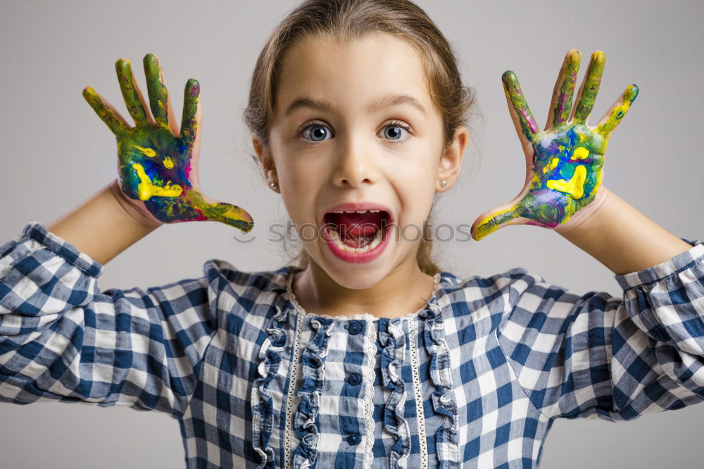 Image, Stock Photo Girl with dirty hands coloring face