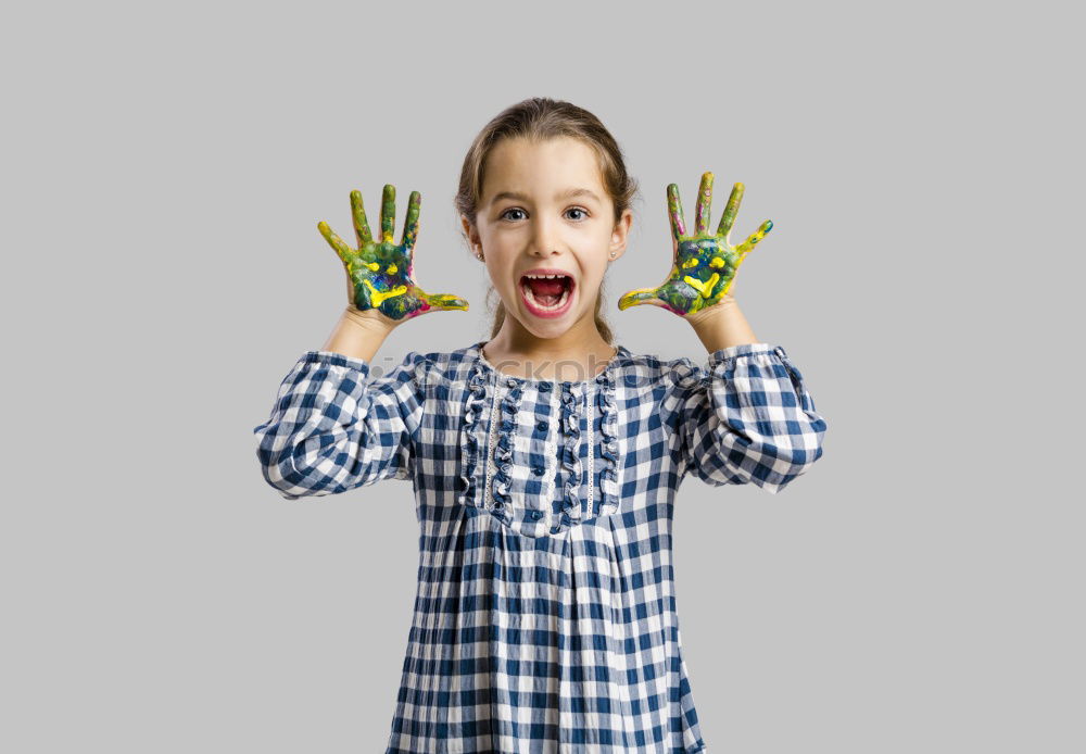 Similar – Image, Stock Photo Girl with dirty hands coloring face