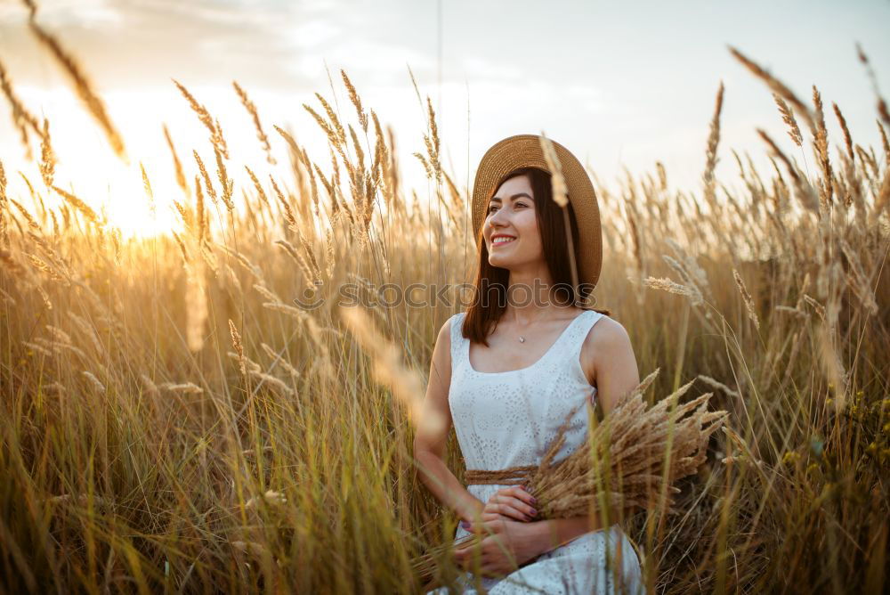 Similar – Image, Stock Photo Portrait of pretty woman smiling in nature