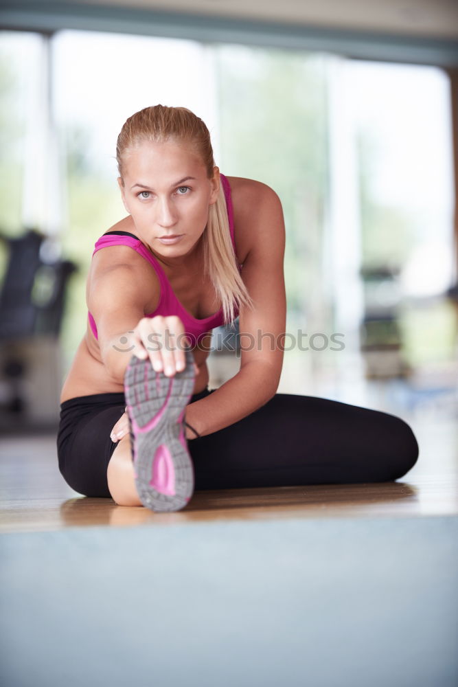 Similar – Happy fit young woman doing stretching exercises