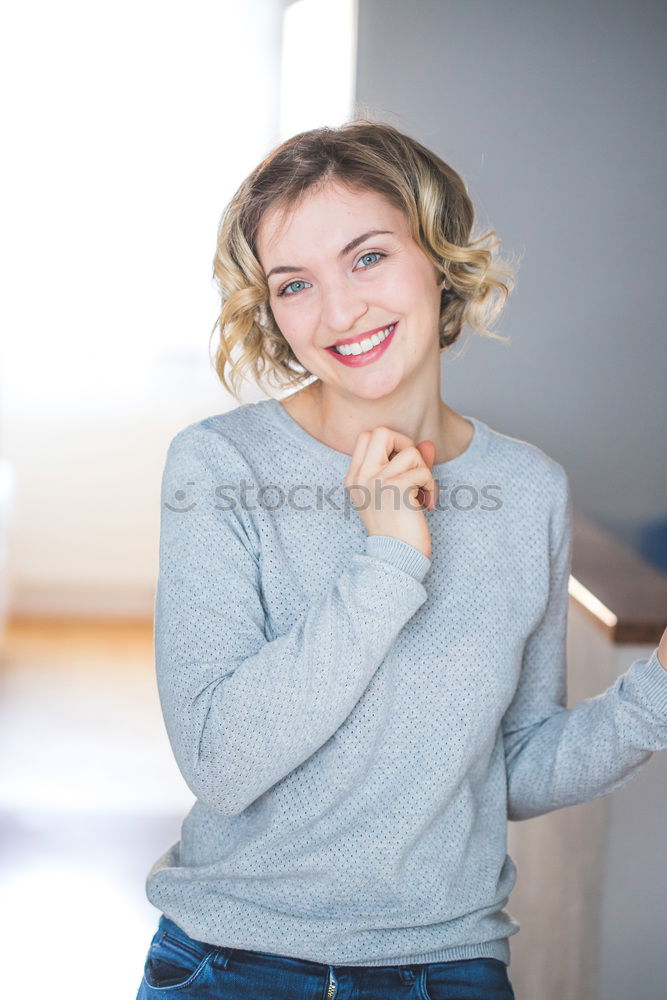 Similar – Image, Stock Photo Young woman, model of fashion, smiling in urban background