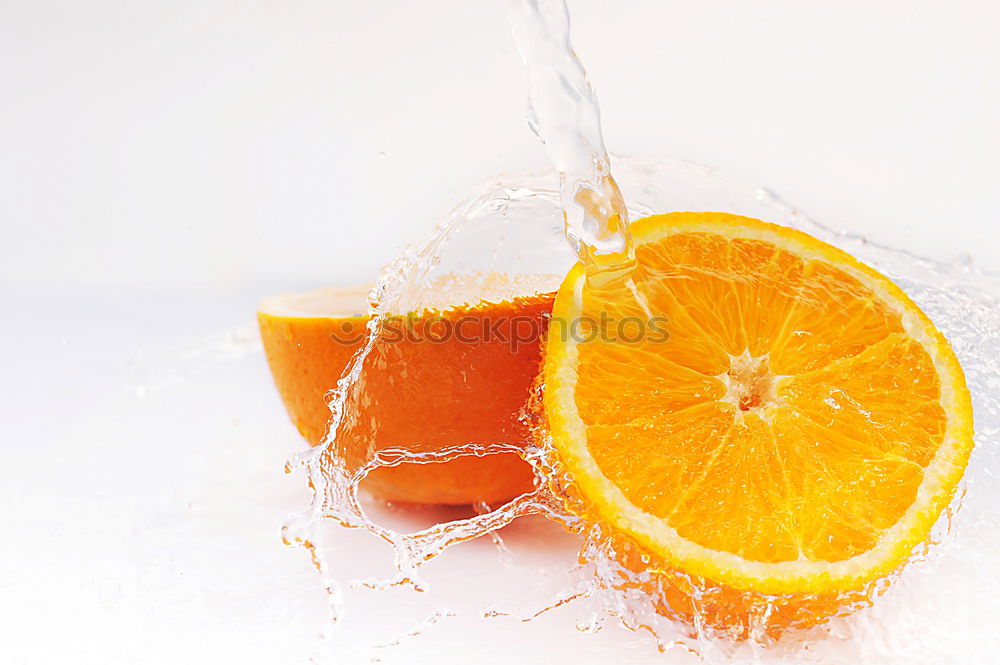 Similar – Image, Stock Photo A glass of soft drink with tangerine, cucumber and straw on white background