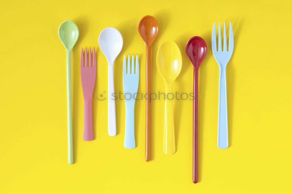 Similar – Image, Stock Photo Colorful of green plastic spoon and fork