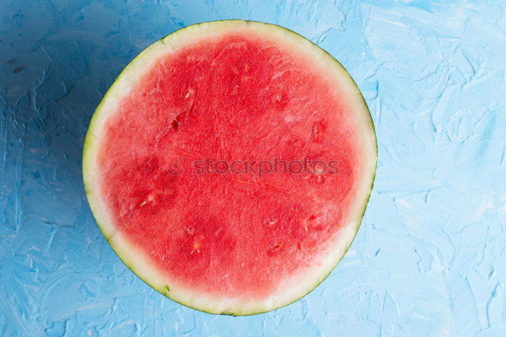 Similar – Pieces of watermelon on background painted in blue