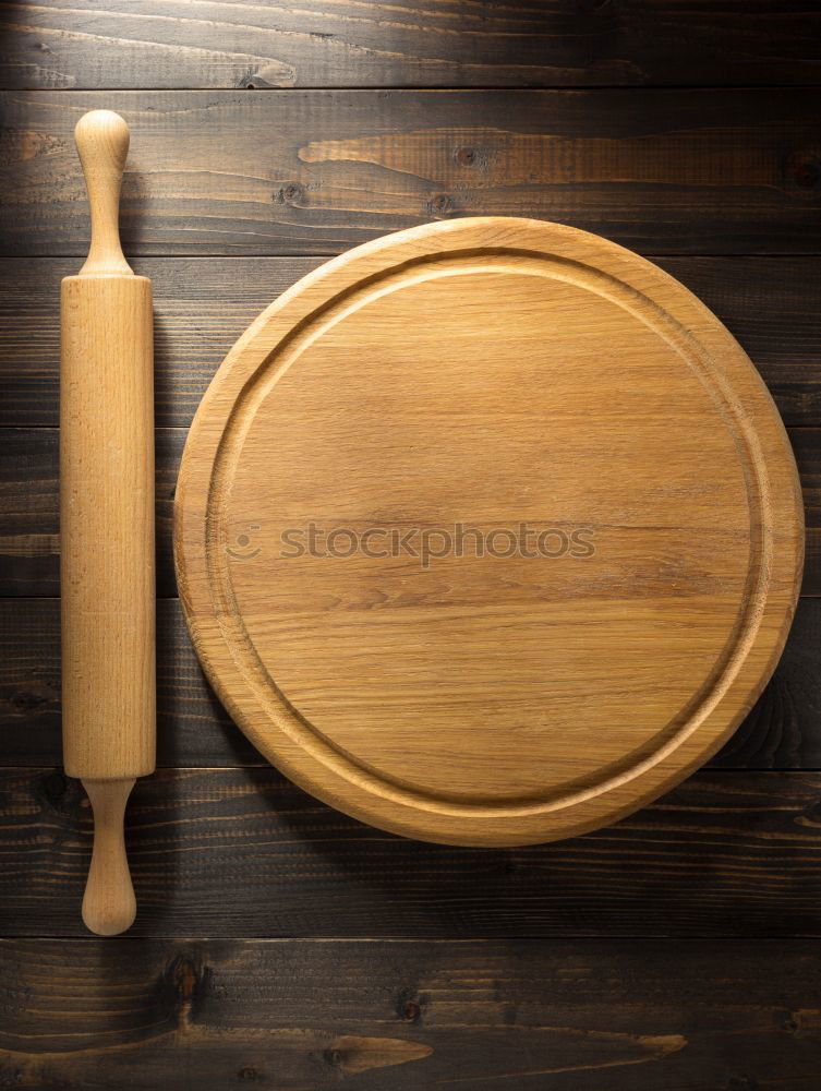 Similar – empty old brown wooden cutting board and spoon