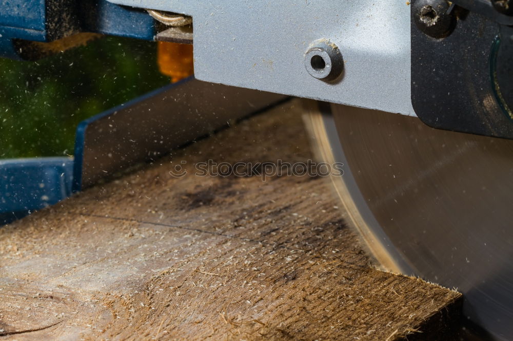 Similar – Blacksmith produces a horseshoe on an anvil with a hammer