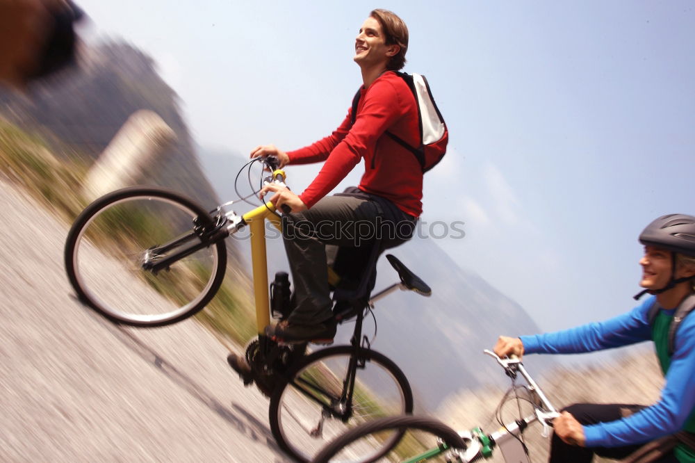 Similar – Image, Stock Photo Women riding bikes in countryside