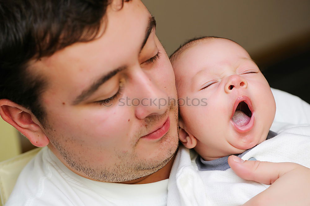 Similar – Image, Stock Photo Father kissing his newborn baby girl.