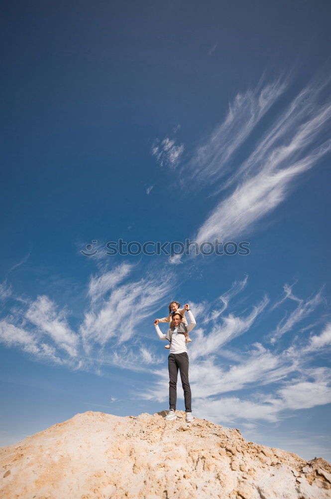 Image, Stock Photo Excited women lying on cliff