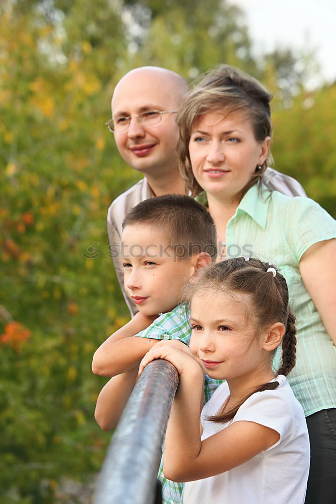 Similar – Image, Stock Photo Father and children walking on the road at the day time.