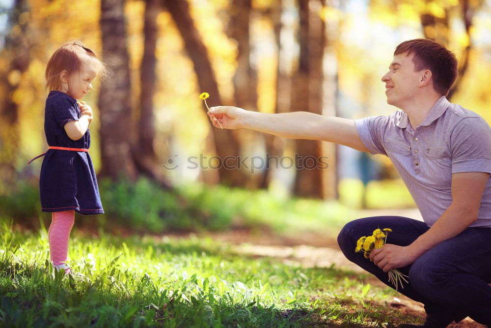 Similar – Image, Stock Photo Father and son walking on the road at the day time. People having fun outdoors. Concept of friendly family.