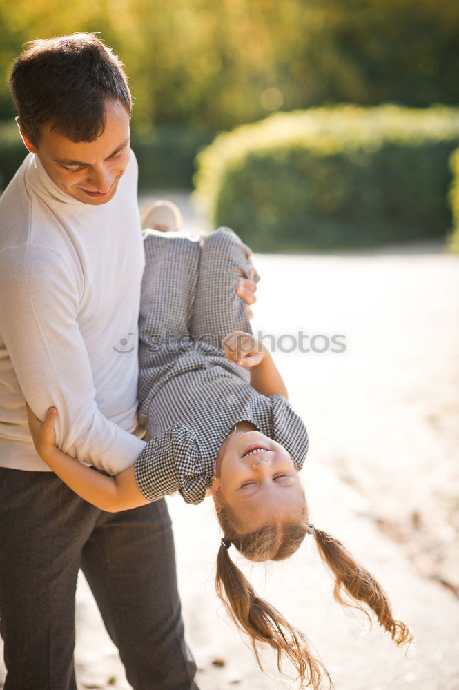 Similar – Happy girlfriend jumping on boyfriend’s back in the street