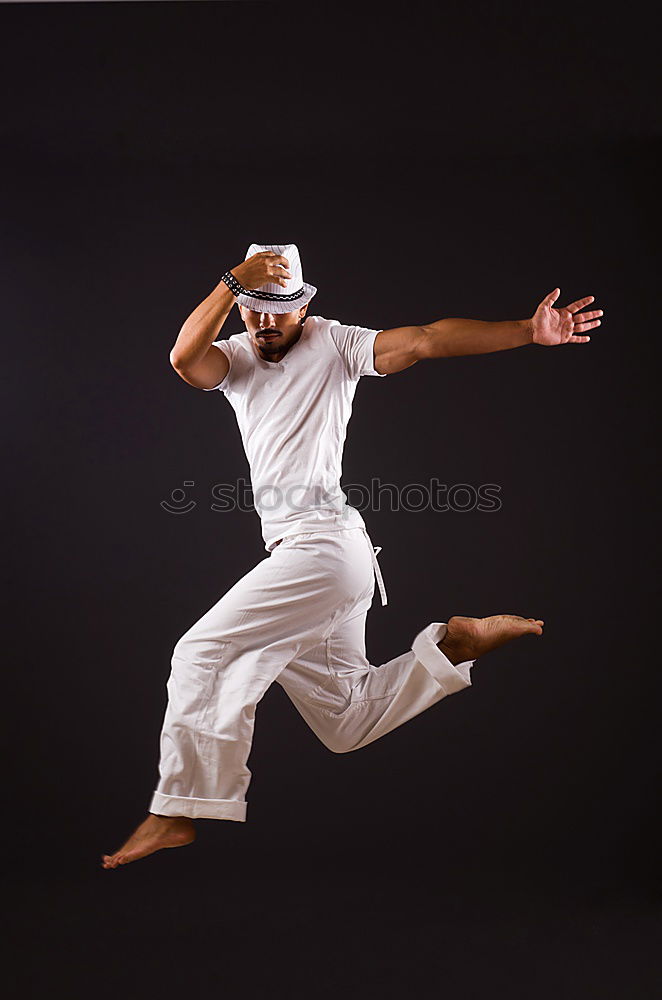 Similar – Sprung! springen Capoeira