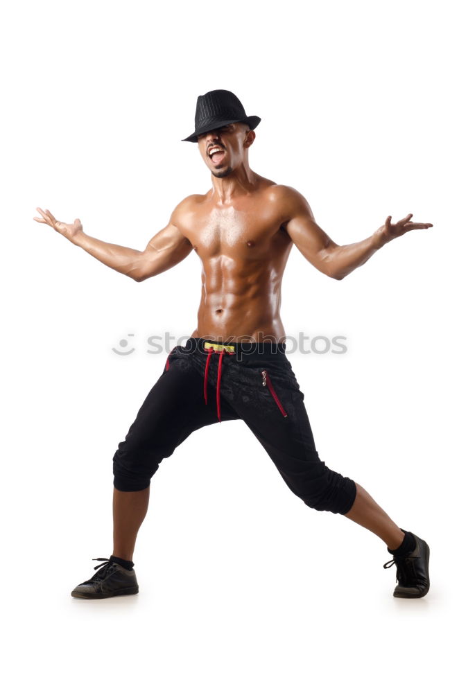 Similar – Fit shirtless young black man doing legs stretching