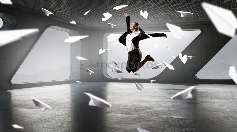 Similar – Woman with jacket jumps barefoot on blue rubber hills