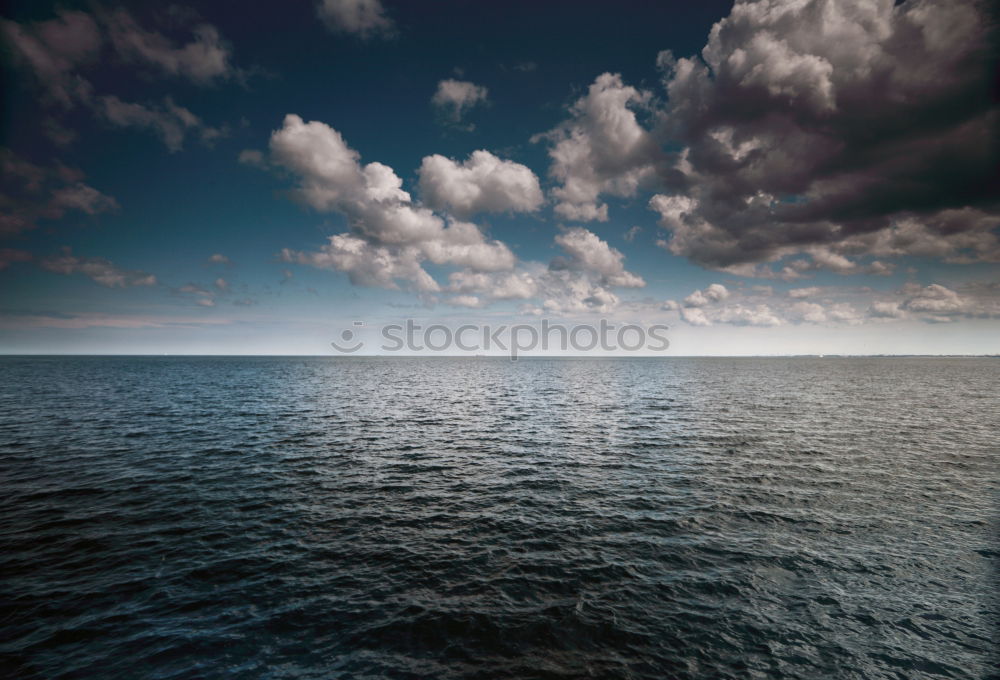 Similar – Image, Stock Photo Rain falls on sea from leaden sky