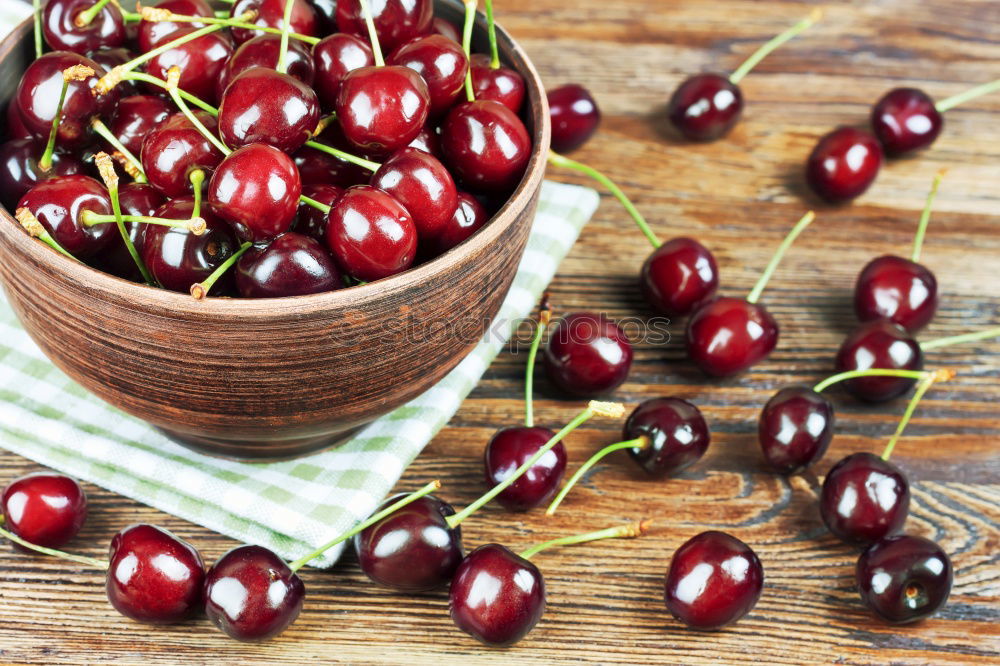 Similar – Image, Stock Photo Ripe red cherry in a paper bag