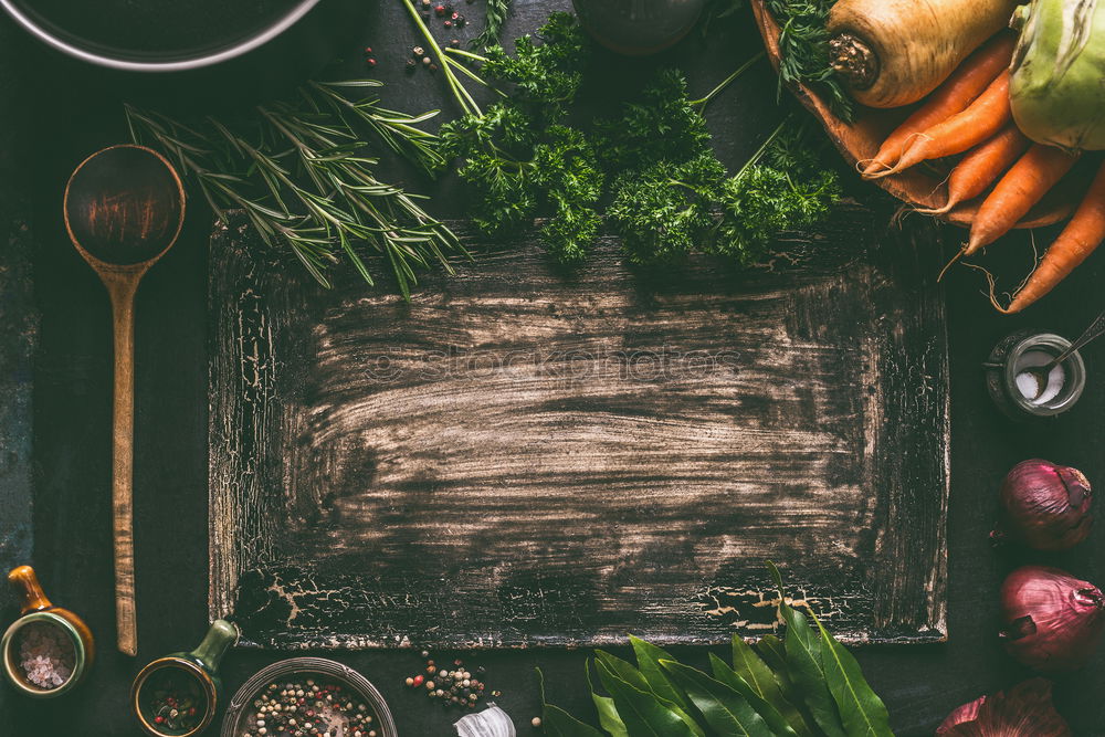 Similar – Image, Stock Photo Wild garlic pesto ingredients on dark rustic kitchen table