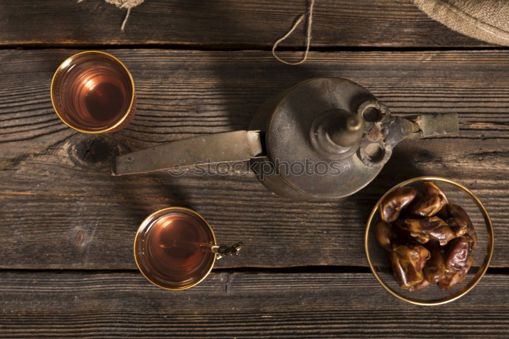 Similar – Asian green tea with teapot, bowls, candle