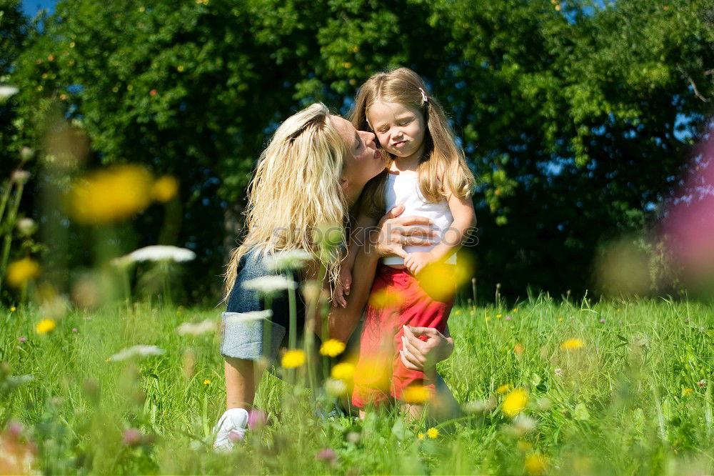 Similar – Three happy children playing in the park at the day time.