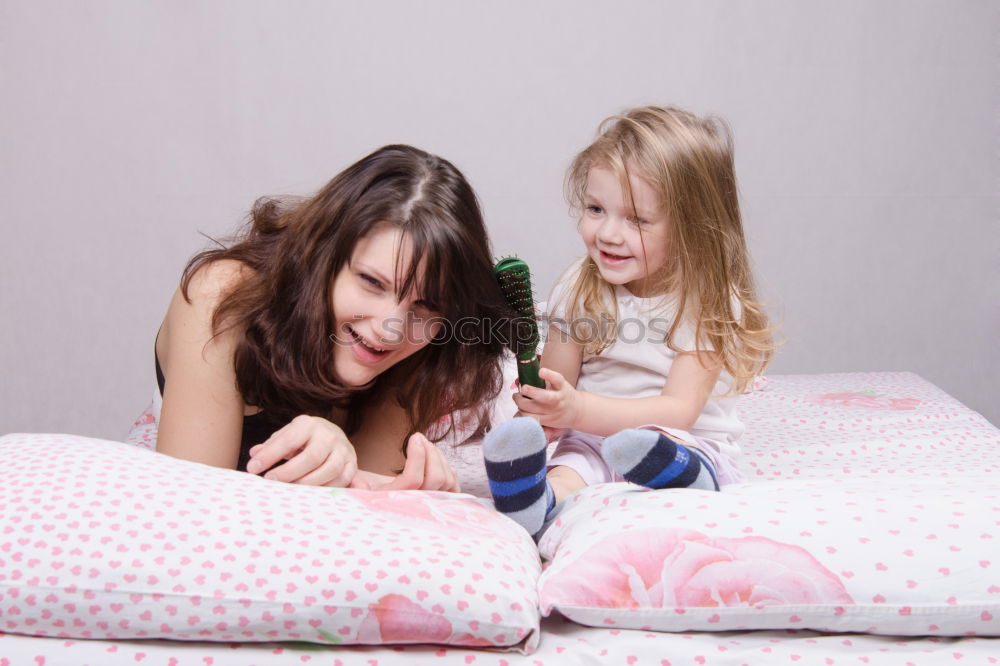 Similar – Image, Stock Photo African mother helping daughter doing homework