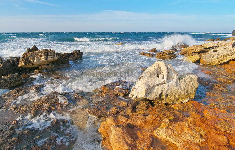 Similar – Rocks with spray in sunset in Portugal