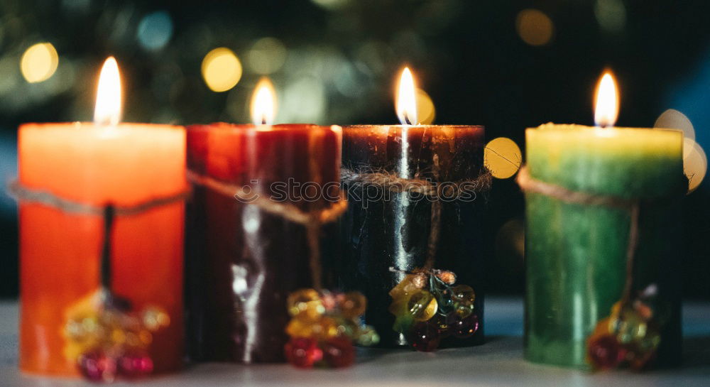 Similar – Colorful tea lights shine for birthday