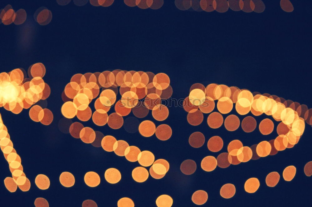 Similar – luminous cross with candles and christmas tree as old Bokeh