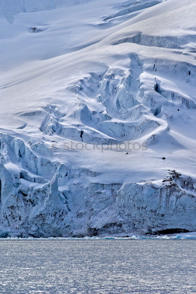 Glacier and sailing boat