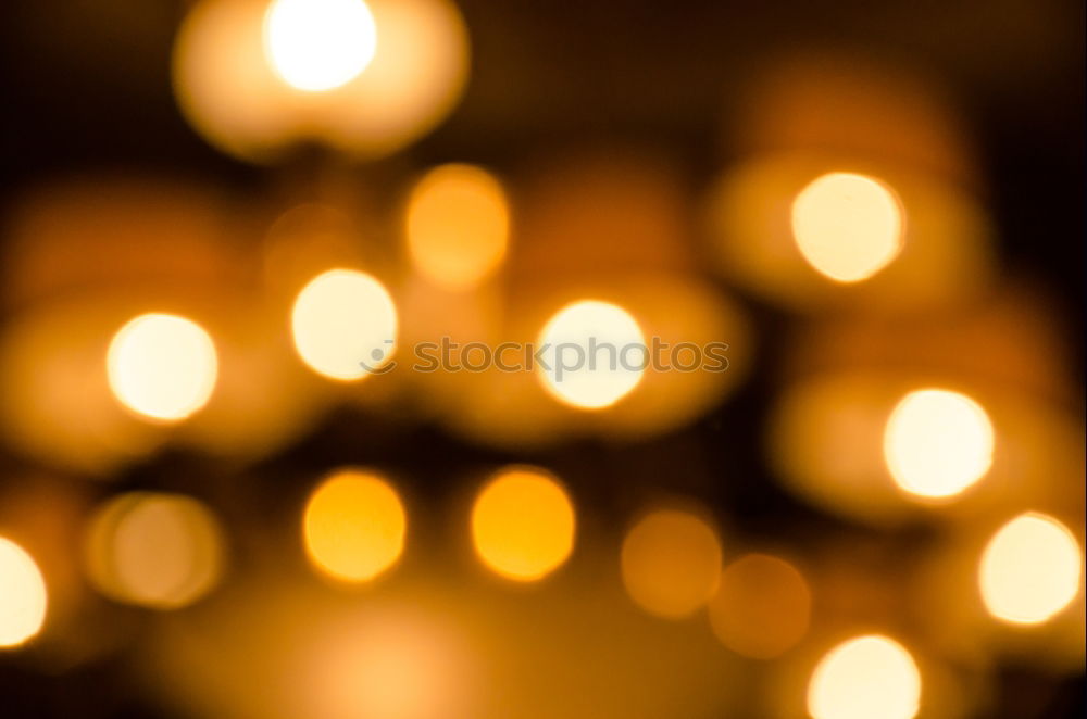 Similar – luminous cross with candles and christmas tree as old Bokeh