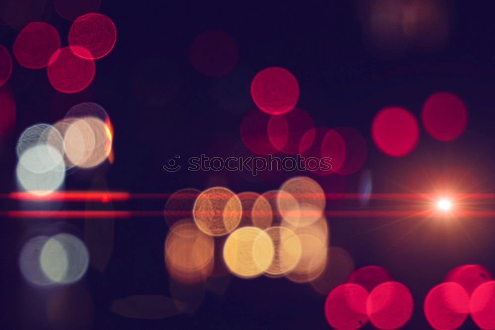 colorful bokeh lights in the city in the street at night