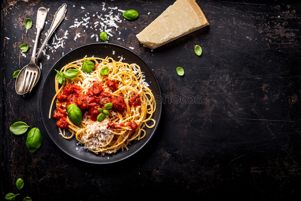 Similar – Image, Stock Photo Spaghetti Carbonara in old pot with parmesan and herbs.