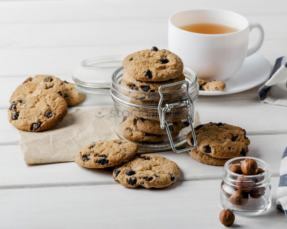 Similar – Image, Stock Photo A few books with cup of coffee and cookies on wooden floor